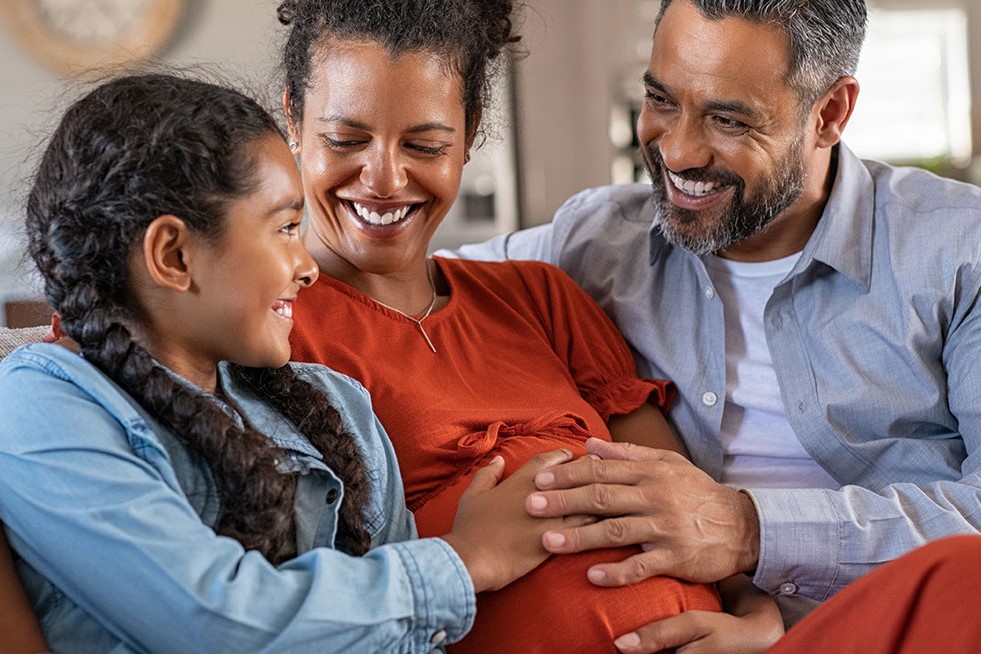 happy family with expecting mother