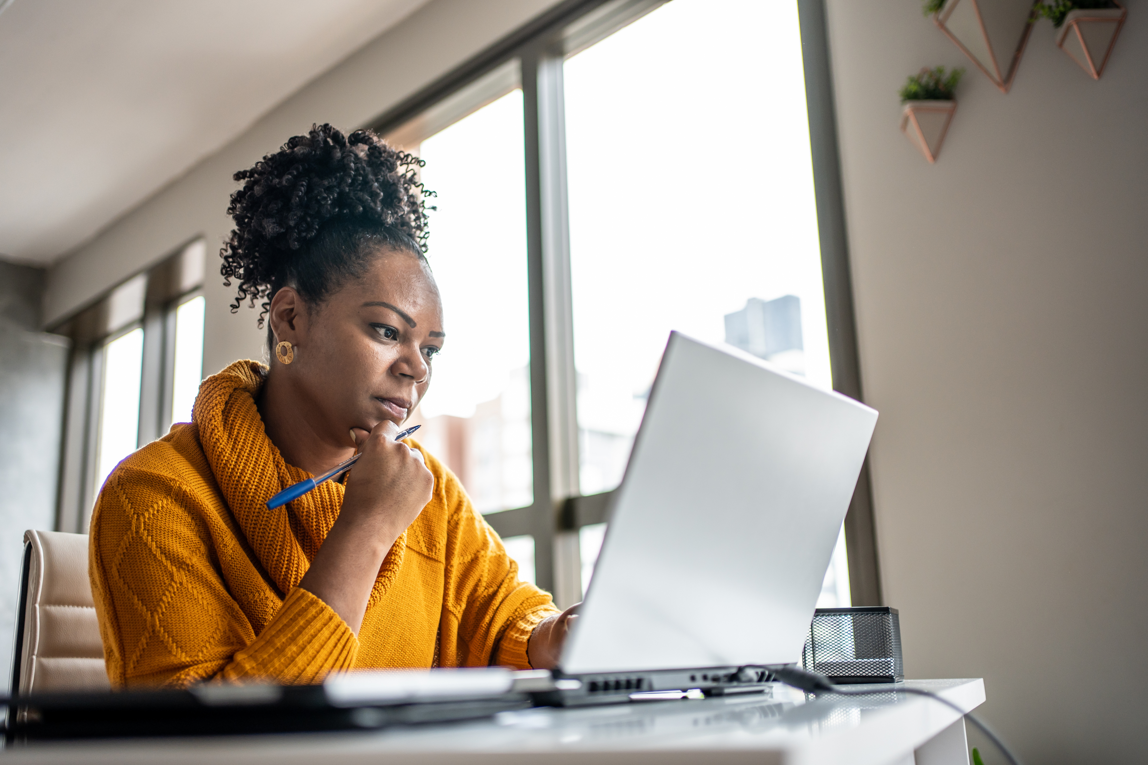 Woman looking at a laptop