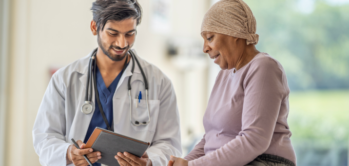 Doctor with a cancer patient.