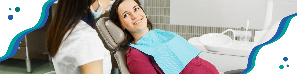 person in dental exam chair 