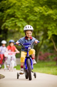 Boy on tricycle